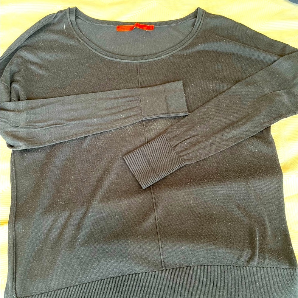 Feel the piece sweater